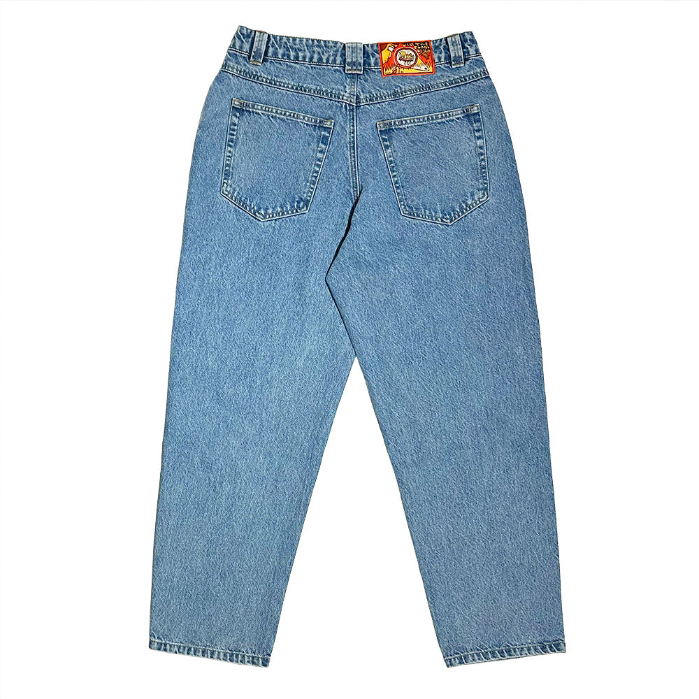 Back view of the BLUETILE BRAND DENIM RUTLEDGE PANT BLUE by Bluetile Skateboards in light blue, showcasing two rear pockets, a colorful waistband patch, and comfortable 100% cotton fabric.