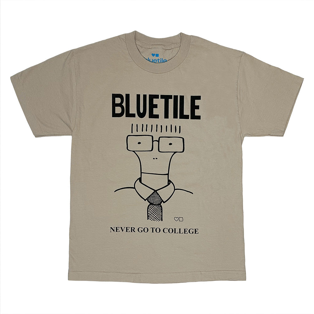 The BLUETILE NEVER GO TO COLLEGE TEE BONE by Bluetile Skateboards is made from heavyweight cotton, featuring "BLUETILE," a cartoon person with glasses and tie, and "NEVER GO TO COLLEGE" printed below.