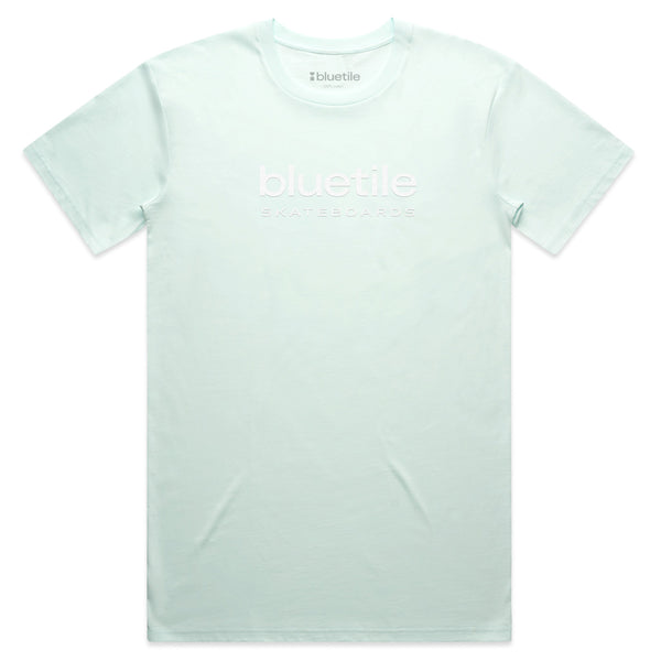 A seafoam BLUETILE PUFF LOGO TEE with the words "Bluetile Skateboards" printed on the front.