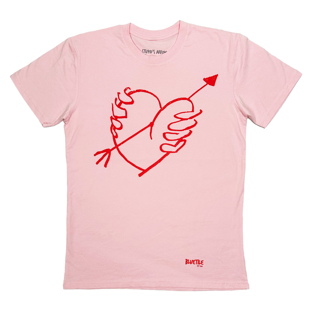 A BLUETILE "STUPID'S ARROW" TEE PINK t-shirt with a heart and an arrow drawn on it featuring the keywords "TEE COAL," by Bluetile Skateboards.