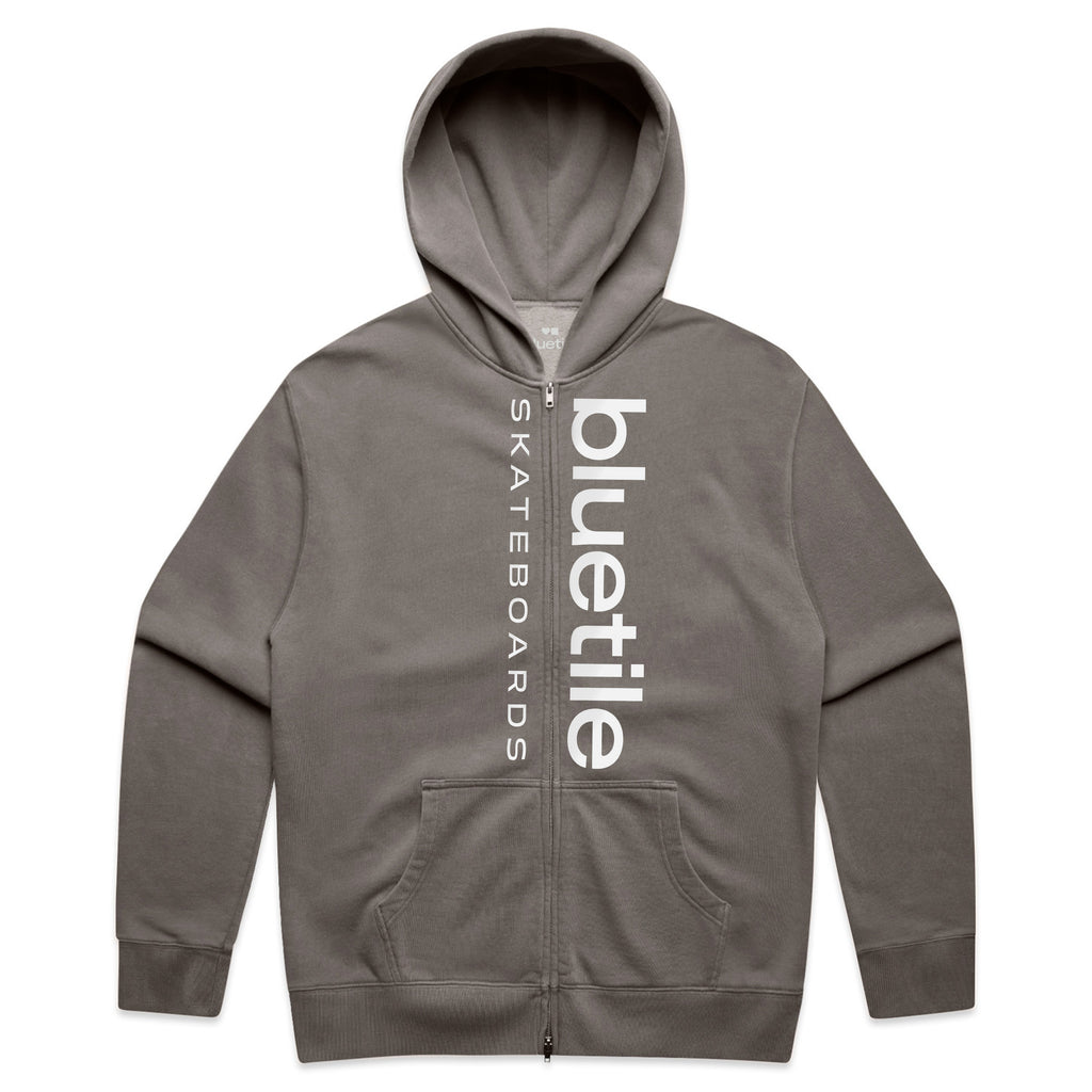 The BLUETILE LOGO DOUBLE ZIP HOODIE in faded grey by Bluetile Skateboards combines style and comfort, featuring a vertical logo on the front.