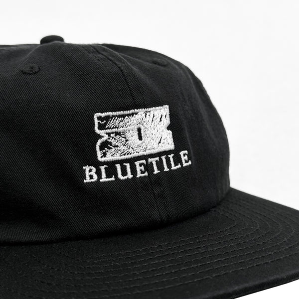 A BLUETILE "RAZOR" CLASSIC HAT BLACK with the word BLUETILE on it.