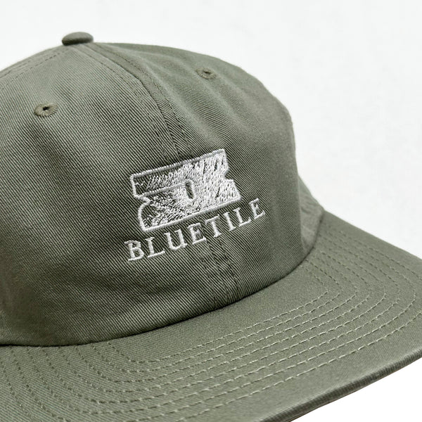 A BLUETILE "RAZOR" CLASSIC HAT EUCALYPTUS with the word blueville on it.