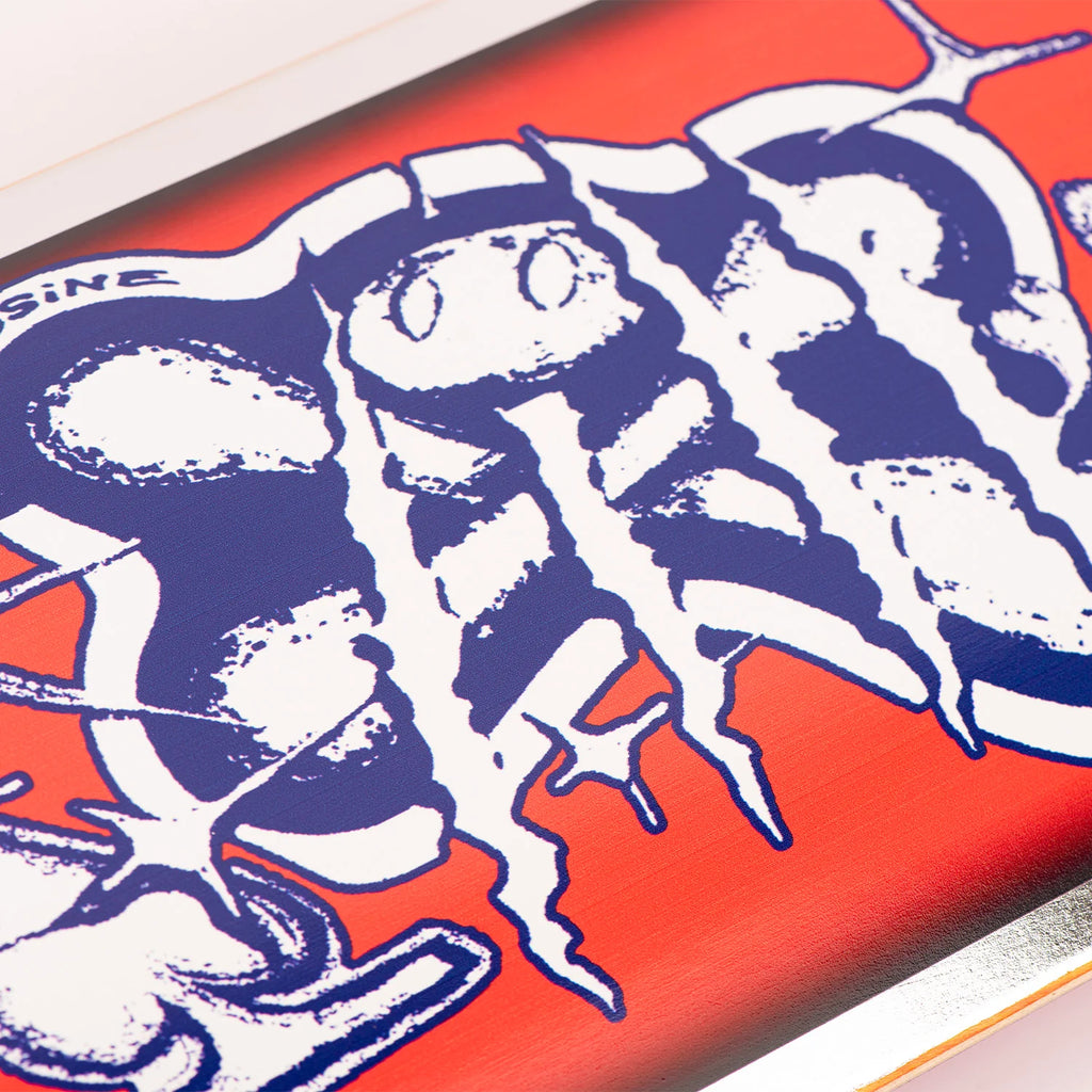 The LIMOSINE BOSERUP BONESAW skateboard features a striking skull and crossbones design. It showcases a unique digital print over silver foil, giving it an eye-catching appearance. The LIMOSINE