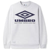 Butter Goods X Umbro Diamond Logo Crewneck in ash, showcasing a navy Umbro logo and "Butter Worldwide" text, adorned with detailed embroidery.