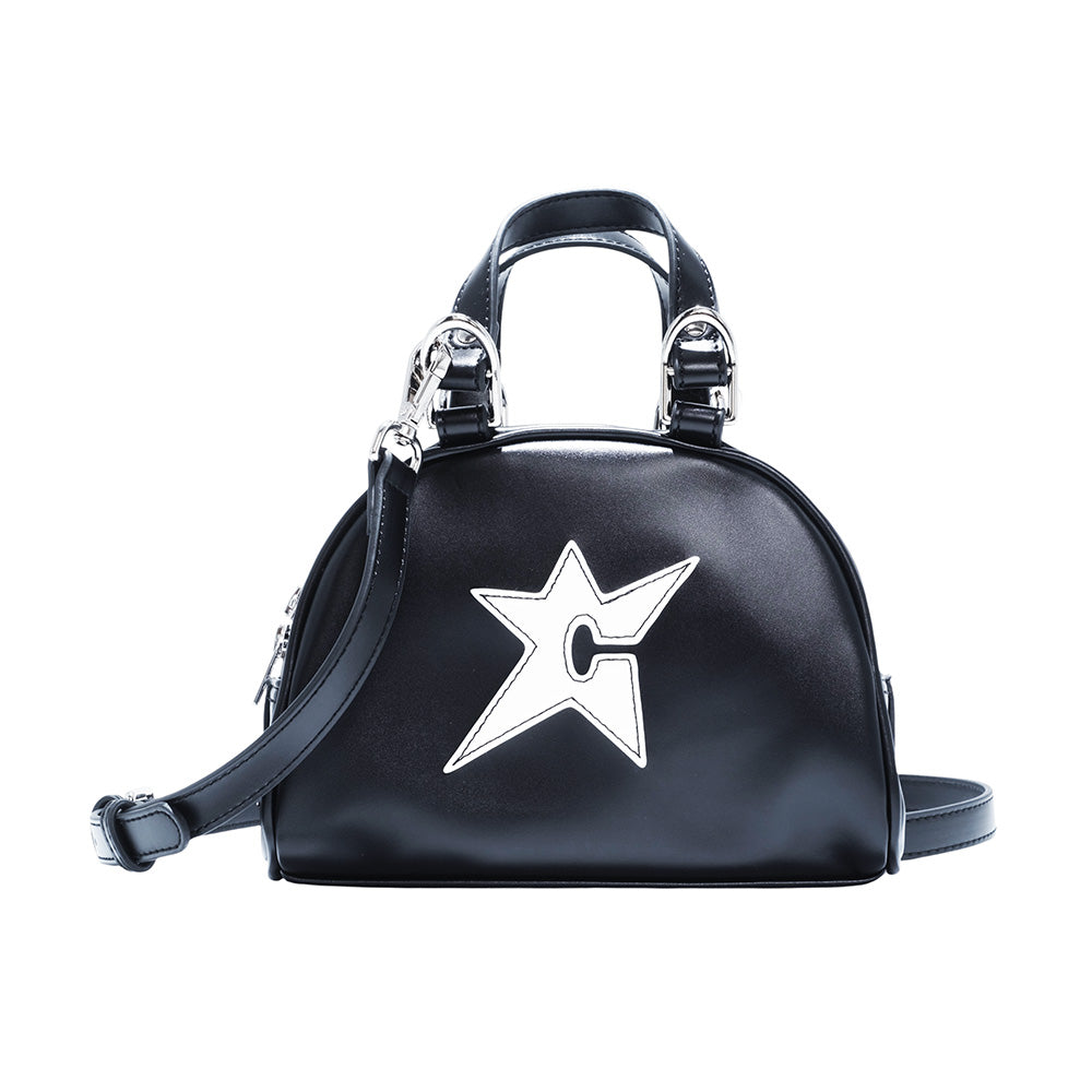 The CARPET CO. C-STAR PURSE BLACK by Carpet Co. is a chic small black leather purse with dual handles, a detachable shoulder strap, silver hardware, and a white outlined star with a "C" on the front—perfect for any outfit.