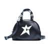 The CARPET CO. C-STAR PURSE BLACK by Carpet Co. is a chic small black leather purse with dual handles, a detachable shoulder strap, silver hardware, and a white outlined star with a "C" on the front—perfect for any outfit.