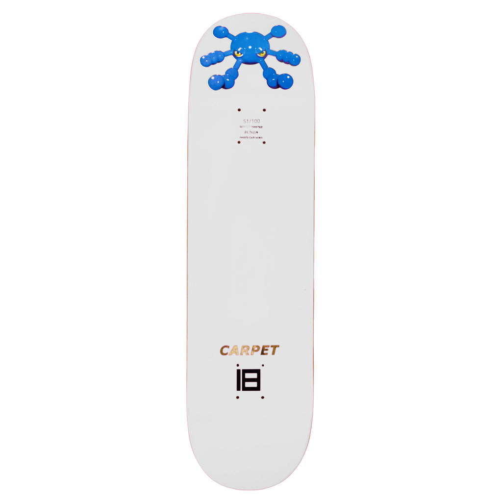 A white skateboard deck from Carpet Co.'s CARPET BACTERIA collection, showcasing a blue octopus graphic at the top and the word "CARPET" above a square symbol near the bottom, with screen-printed designs that emphasize its unique style.