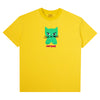 The CARPET CO. CAT TEE YELLOW by Carpet Co. is a yellow cotton tee with a green cartoon cat, black whiskers, and "carpet" printed below in pink and red letters.