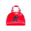 The CARPET CO. C-STAR PURSE RED by Carpet Co. is a small, glossy red leather purse with double handles and a front black star patch with the letter "C".