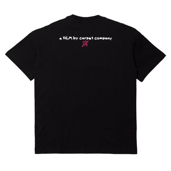 The Carpet Co. BRAT TEE BLACK with the text "a film by carpet company" and a small rose pink star logo on the back.