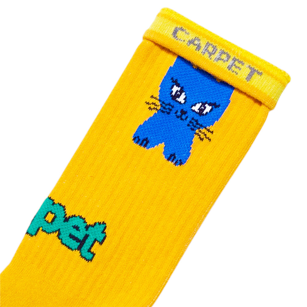 The STANCE CARPET CO. CAT SOCK YELLOW showcases playful kitty cat artwork near the top and features "CARPET" in blue and green text on the side.