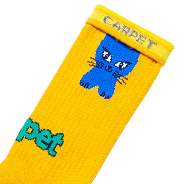 The STANCE CARPET CO. CAT SOCK YELLOW showcases playful kitty cat artwork near the top and features "CARPET" in blue and green text on the side.