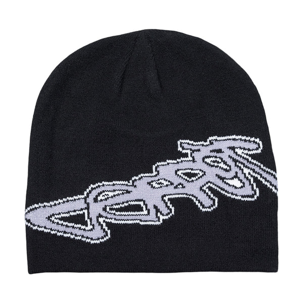 The Carpet Co. Freestyle Beanie Black is a cotton beanie with a bold white "carrot" logo across the front, inspired by the classic Freestyle Beanie design.