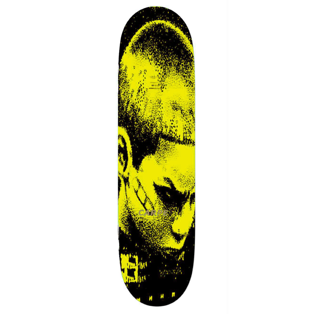 A Carpet Co. skateboard with a yellow and black image of a man, perfect for showcasing base colors.