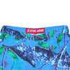 The CARPET CO. REALTREE PANT BLUE by Carpet Co. showcases a vibrant nature-themed print with green leaves and branches, styled in the distinctive REALTREE design, and features a red label that reads "Star Jeans.