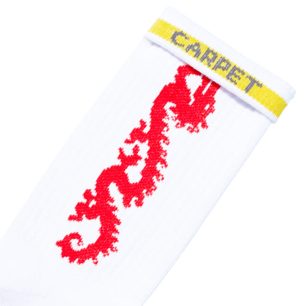 The STANCE CARPET CO. DRAGON SOCK WHITE features custom red dragon artwork, a yellow band at the top, and "CARPET CO" in gray lettering.