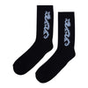 The STANCE CARPET CO. DRAGON SOCK BLACK features custom artwork—a light blue dragon design on the side of each black sock.