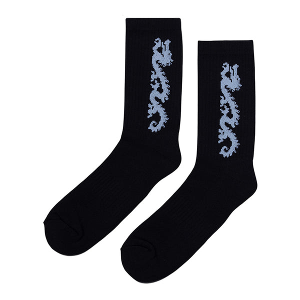 The STANCE CARPET CO. DRAGON SOCK BLACK features custom artwork—a light blue dragon design on the side of each black sock.