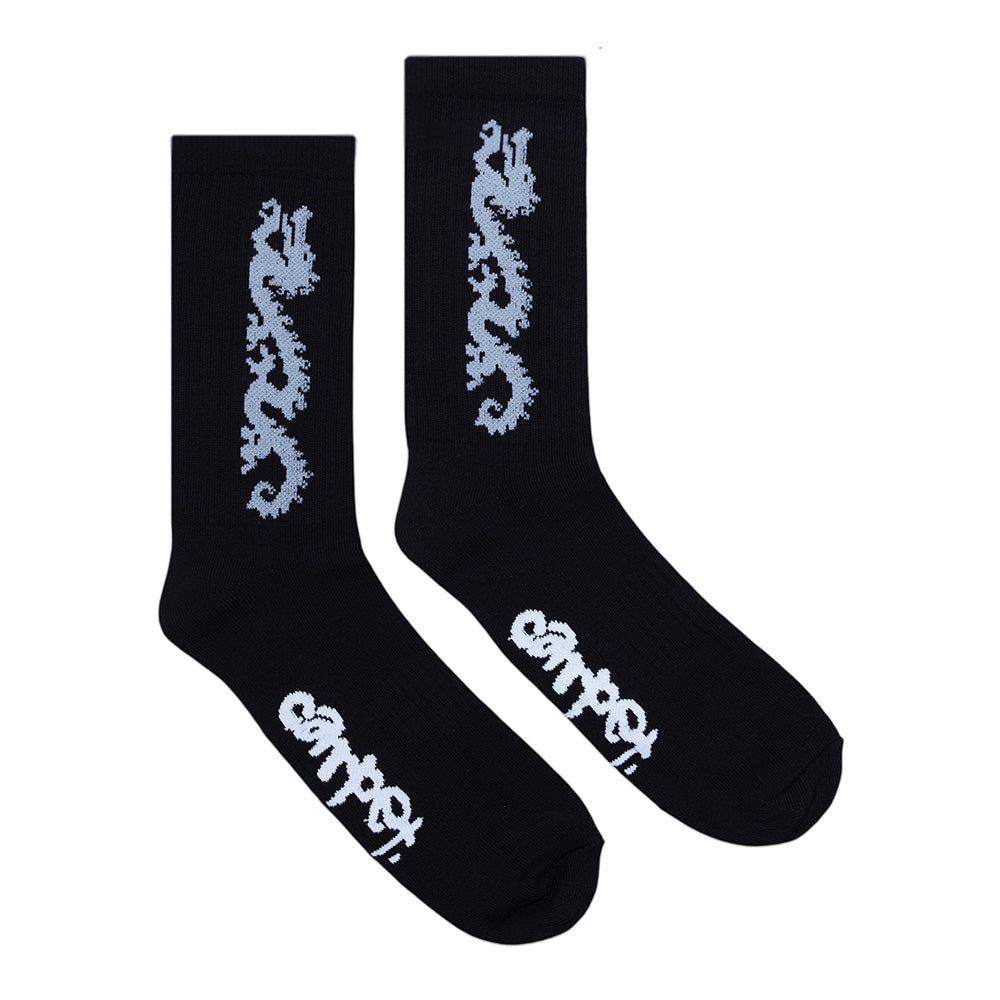 The STANCE CARPET CO. DRAGON SOCK BLACK features custom light blue dragon artwork on the side and a stylized white logo on the foot.