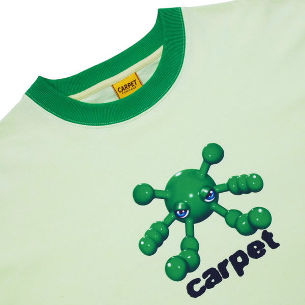 A white CARPET BACTERIA RINGER TEE GREEN by Carpet Co. featuring green trim and a cartoon-green molecule with eyes, along with the word "BACTERIA" printed below it.