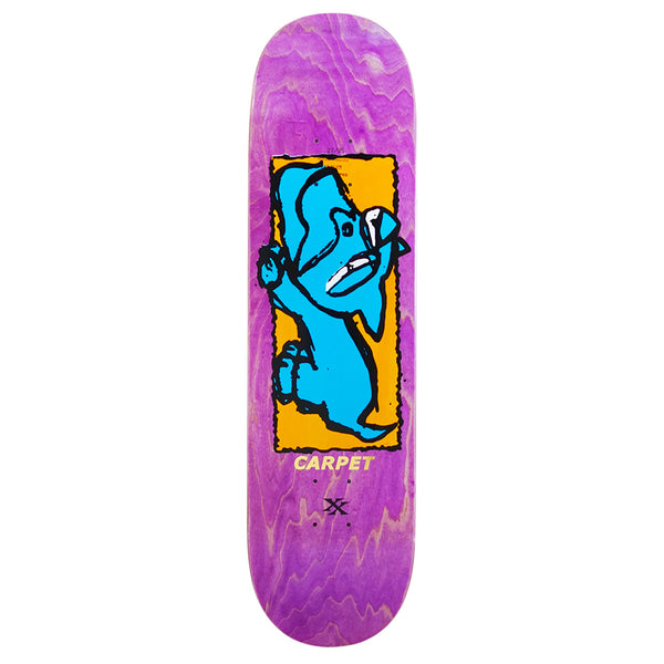 Limited edition CARPET DUMB DOG deck by Carpet Co.—a purple skateboard hand-screened with a yellow rectangle, blue cartoon dog holding an object, and "CARPET" below—a unique vinyl collector’s piece.