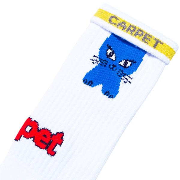 The STANCE CARPET CO. CAT SOCK WHITE features blue cat artwork, "CARPET" in yellow at the cuff, and "pet" in red on the side—a playful design by Carpet Co.