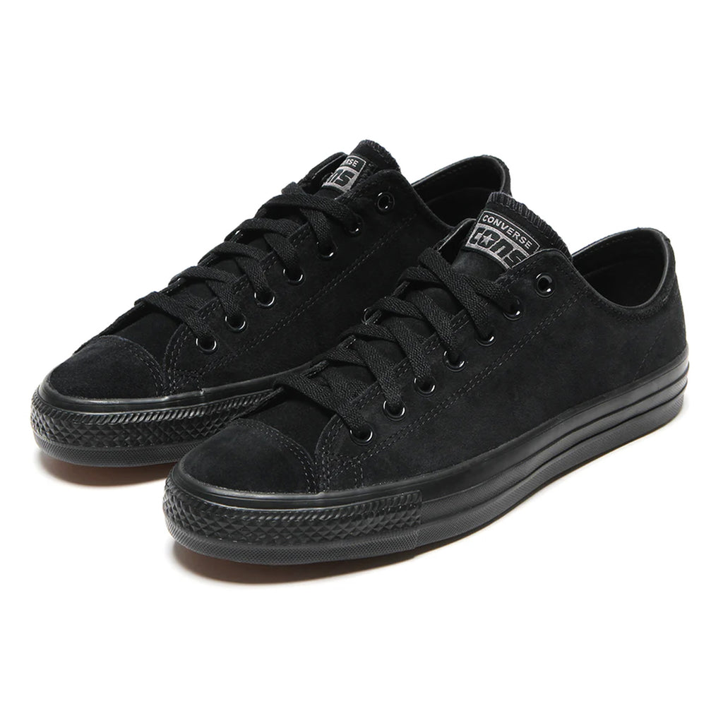 A pair of black low-top CONVERSE CONS CHUCK TAYLOR ALL STAR PRO OX SUEDE BLACK / BLACK sneakers with black laces, rubber soles, a canvas upper, and CX foam cushioning for added comfort.