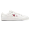 A white CONVERSE x TURNSTILE ONE STAR PRO OX WHITE / PINK sneaker with a pink star on it.