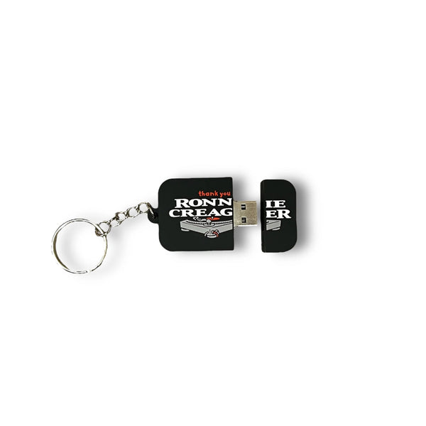 USB flash drive keychain with a black casing and "THANK YOU CREAGER MIX MASTER PLATINUM GUEST MODEL" printed text from THANK YOU brand.