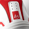Close-up of the éS TJ ROGERS WHITE / RED sneaker by ES, showing a red logo with white script on the heel, textured red fabric accents, and an E-Bound midsole for impact-resistant comfort.