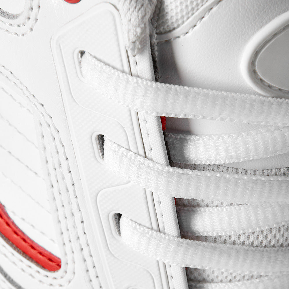 Close-up of the éS TJ ROGERS WHITE / RED sneaker by ES, showing white laces, stitched details, a red accent on the side, and an E-Bound midsole for comfort and impact resistance.