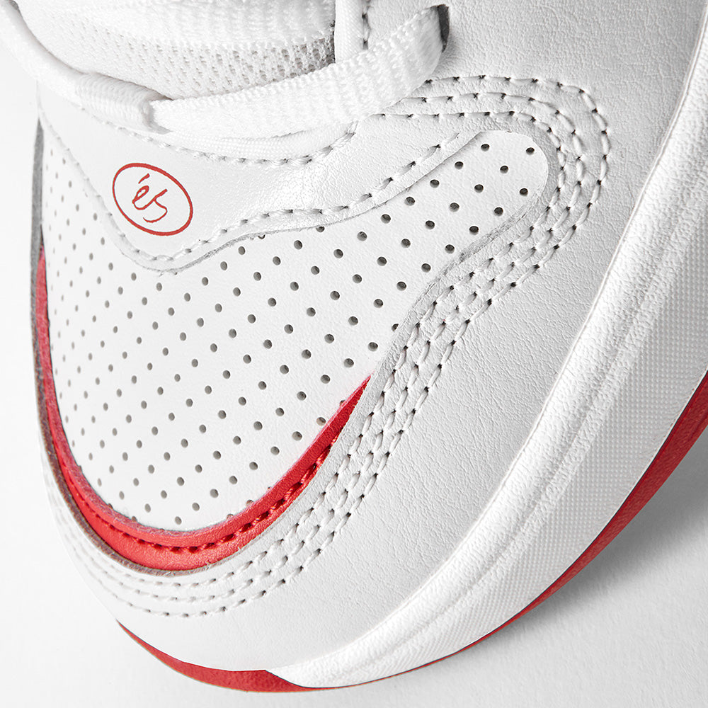 Close-up of the toe area of the éS TJ ROGERS WHITE / RED sneaker by ES, featuring red accents, perforated details, white laces, and a durable, impact-resistant E-Bound midsole.