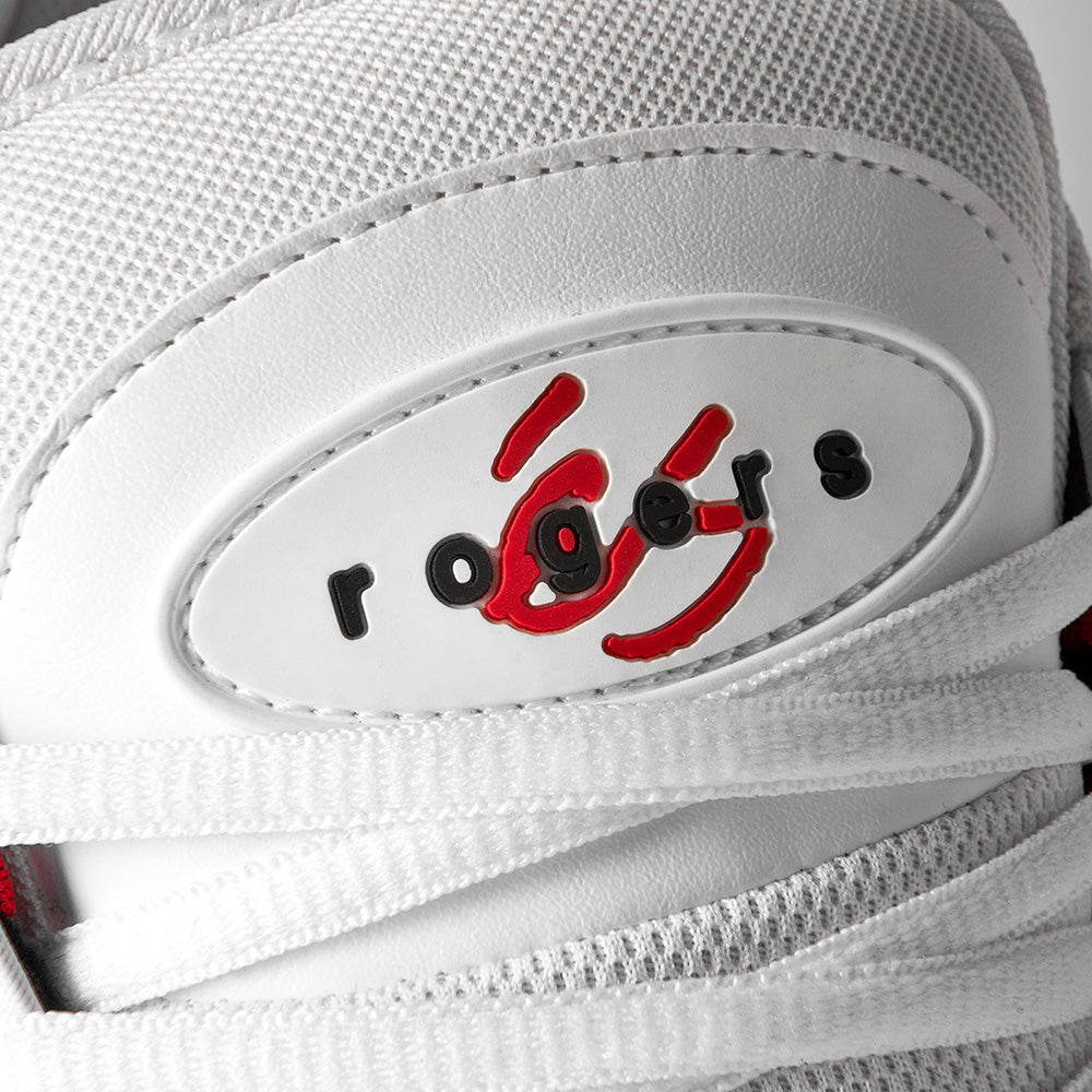 Close-up of the éS TJ ROGERS WHITE / RED sneaker by ES, showcasing "rogers" and a red and black logo on the tongue. Features white laces and an impact resistant E-Bound midsole for superior comfort.
