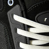 Close-up of the éS TJ ROGERS BLACK / BLUE / WHITE skate shoe by ES, featuring white laces through black eyelets and a classic cupsole inspired by the iconic éS ACCEL.