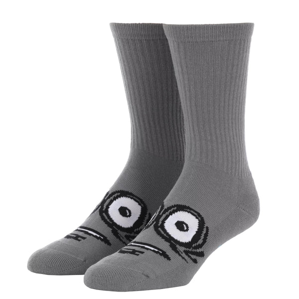 A pair of HEROIN BIG EGG SOCKS GREY with cartoon eyes printed on the toes, isolated on a white background.