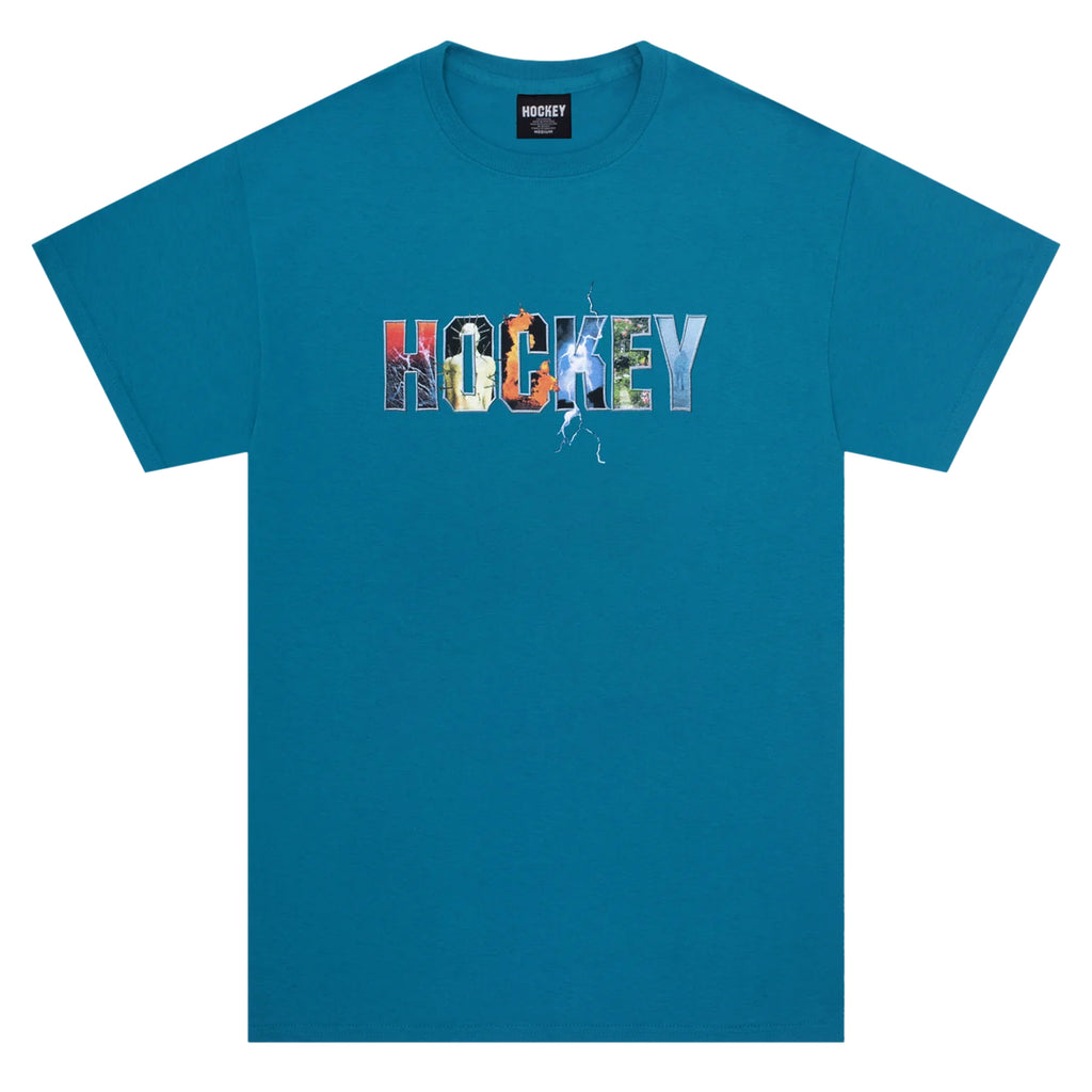 A blue 100% cotton T-shirt with the word "HOCKEY" printed on the front in large letters using puff ink, each filled with various graphic designs and images. This stunning HOCKEY DAVE'S ARENA TEE BLUE from HOCKEY combines comfort and style effortlessly.