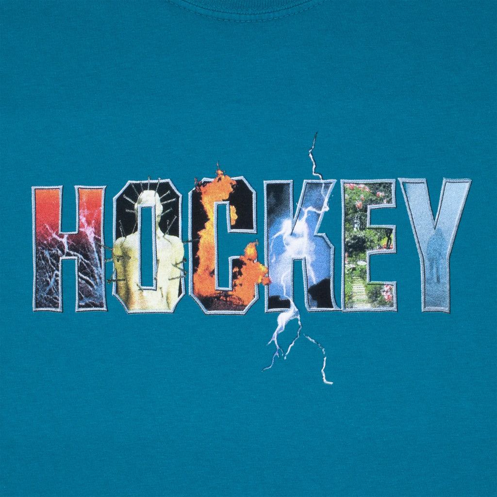 The word "HOCKEY" is displayed in uppercase letters, with each letter featuring a unique graphic design element, such as explosions, lightning, and nature scenes, against a teal background. This vibrant design would look stunning on a HOCKEY DAVE'S ARENA TEE BLUE or as part of our Puff Ink Printed Shirt collection by HOCKEY.