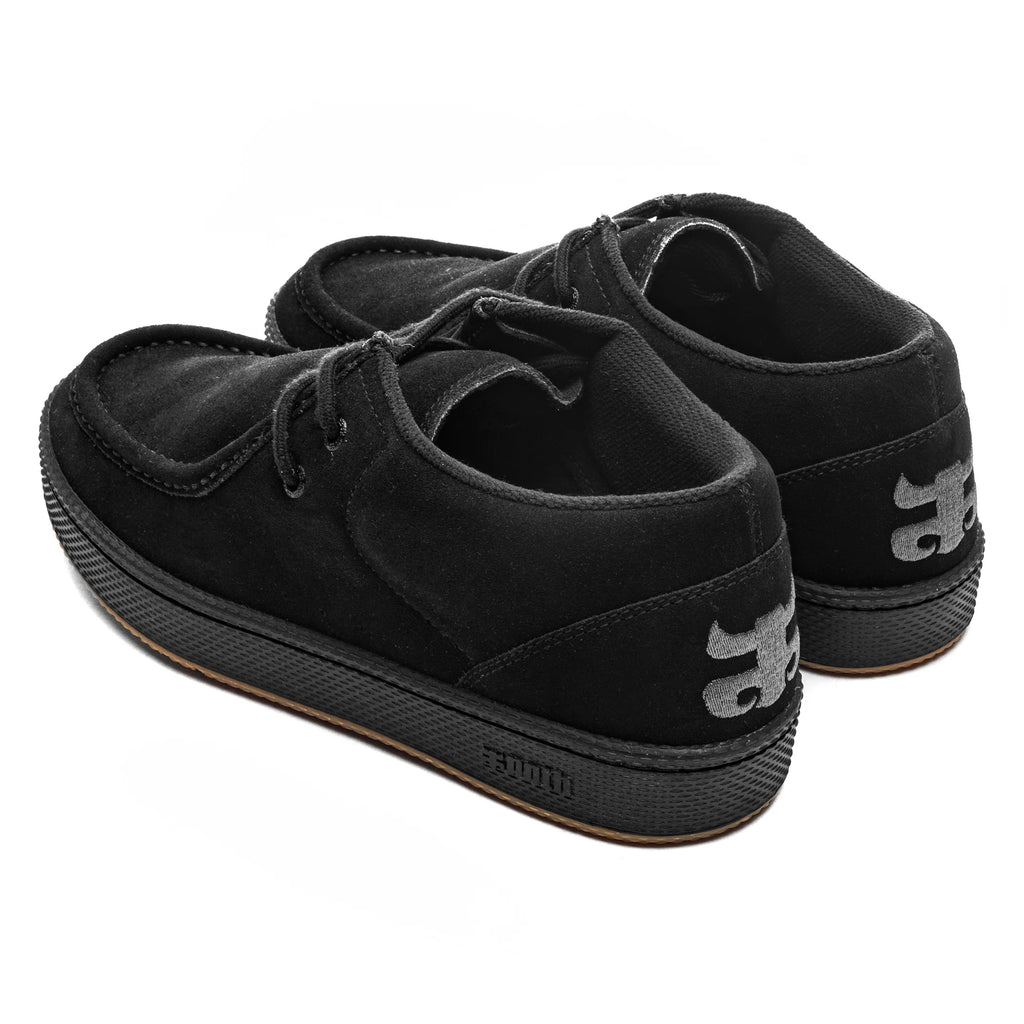 A pair of IPATH CATS BLACK SUEDE shoes in black, featuring black rubber soles, a white logo on the heel and laces, and an Ortholite insole for added comfort.