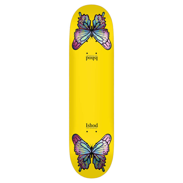 Bright yellow skateboard with two colorful, symmetrical butterfly designs, positioned near each end. The name "Ishod" is printed twice in black at opposite ends. This 8.25" REAL ISHOD MONARCH TWIN TAIL YELLOW board exemplifies the quality of REAL craftsmanship.