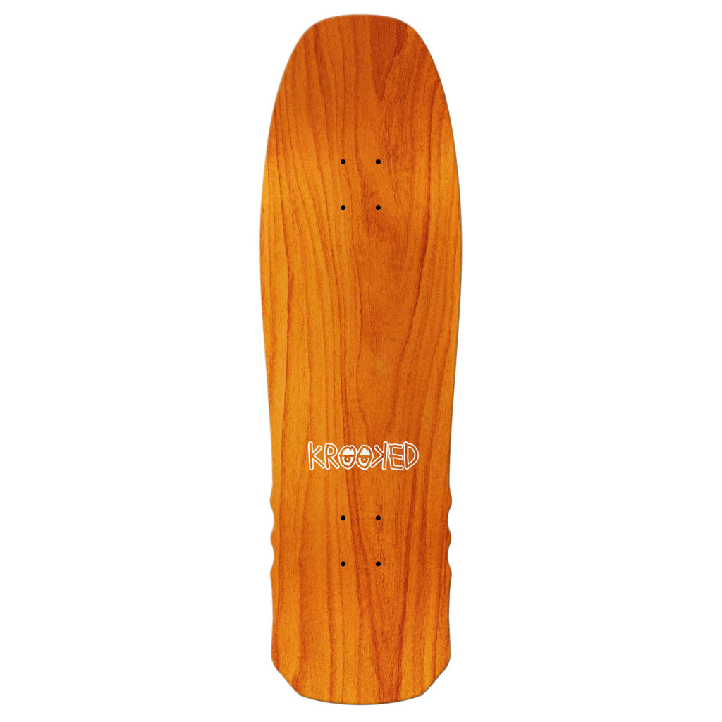 A KROOKED BARBEE SHRIMP TACO skateboard deck with a natural finish and the word "Krooked" printed in white on the lower part, perfect for cruising while dreaming about shrimp tacos.