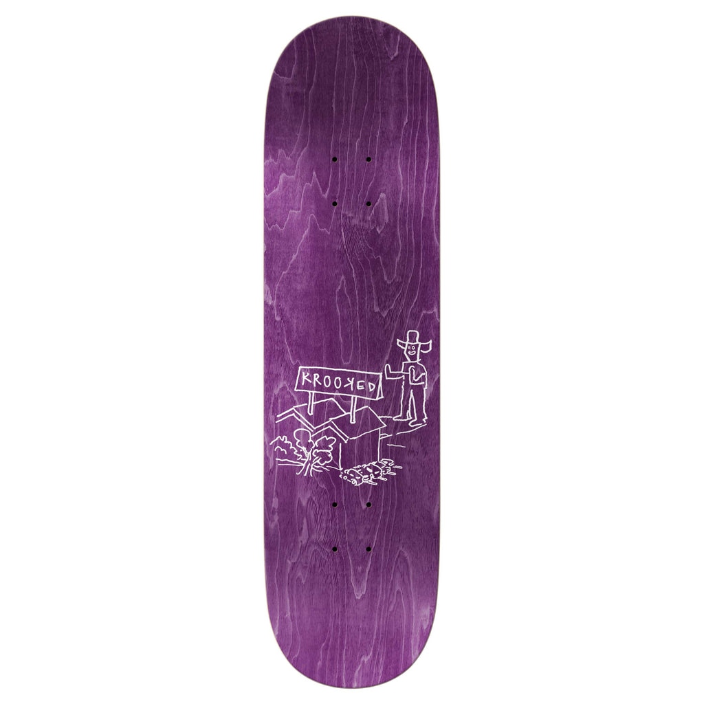 A purple skateboard deck features a white illustration of a person standing next to a sign that reads "Krooked." This guest board, the KROOKED MANDERSON THE YARD, is perfect for skating enthusiasts.