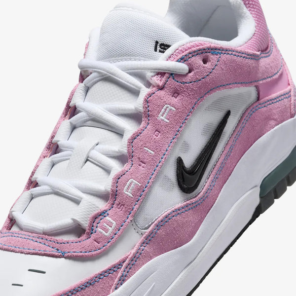 Close-up of a pink and white Nike SB Ishod 2 Air Max sneaker featuring a black Nike swoosh logo on the side.