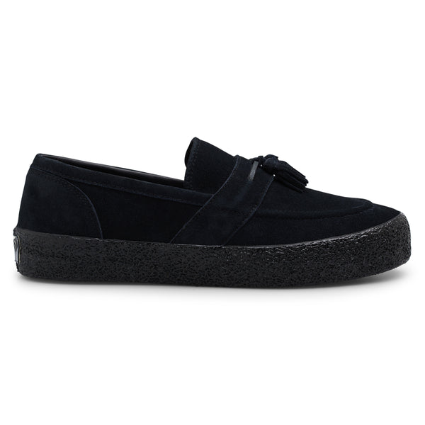 A LAST RESORT AB black loafer with tassels and a black sole featuring a suede upper.