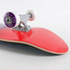 A close up of a Habitat skateboard on a white surface, specifically the Habitat Leaf Dot Purple Complete.