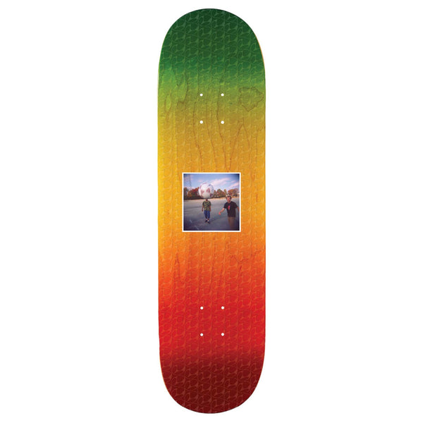 A LIMOSINE skateboard deck displaying a gradient from yellow to red with a hexagonal pattern and a centered photo of Cyrus Bennett.