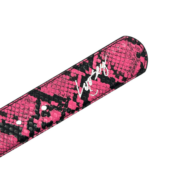 Close-up of a pink, black, and white nail file with a scaled pattern reminiscent of a LOOSEY SLITHER BELT PINK and a white signature logo from Loosey.