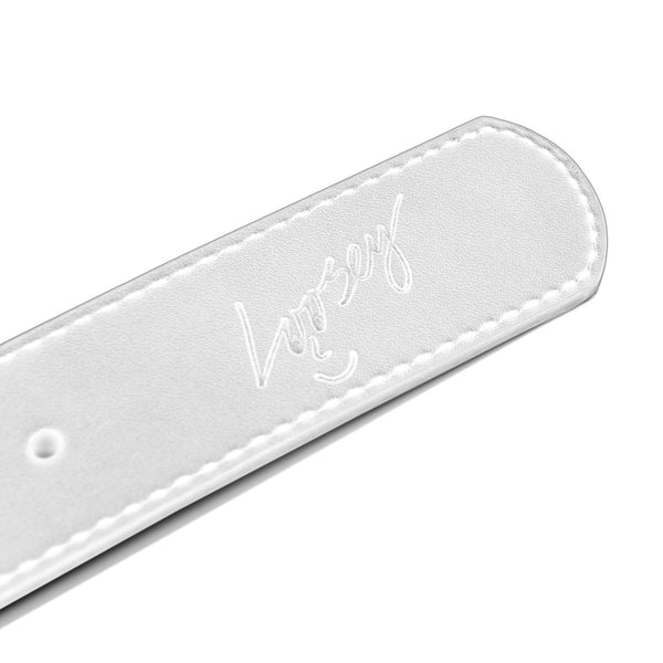 Close-up of a white faux leather belt with white stitching, featuring the embossed word "Loosey" and a small smiley face. The product is the LOOSEY STUD FINDER BELT WHITE by Loosey.