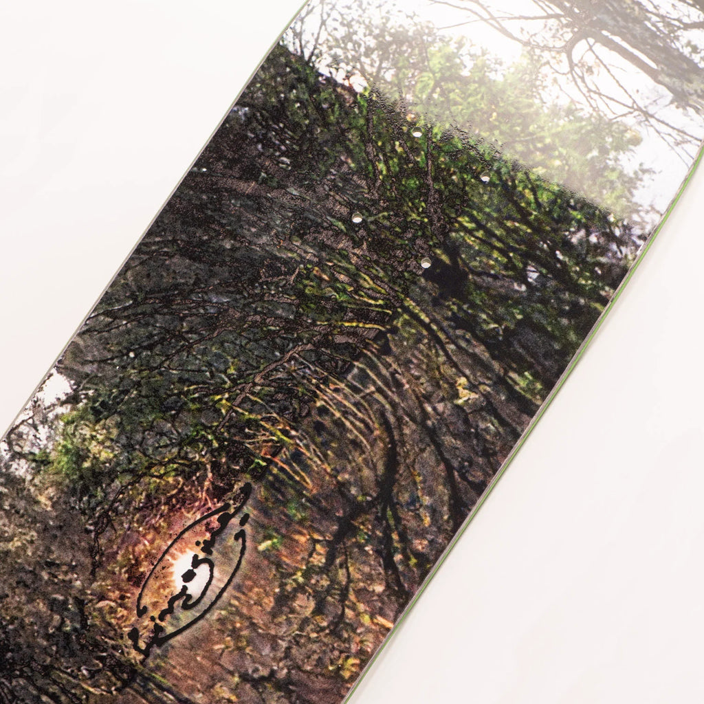 A LIMOSINE skateboard featuring a digital print of trees, designed by Aaron Loreth as part of his Pro Model line.