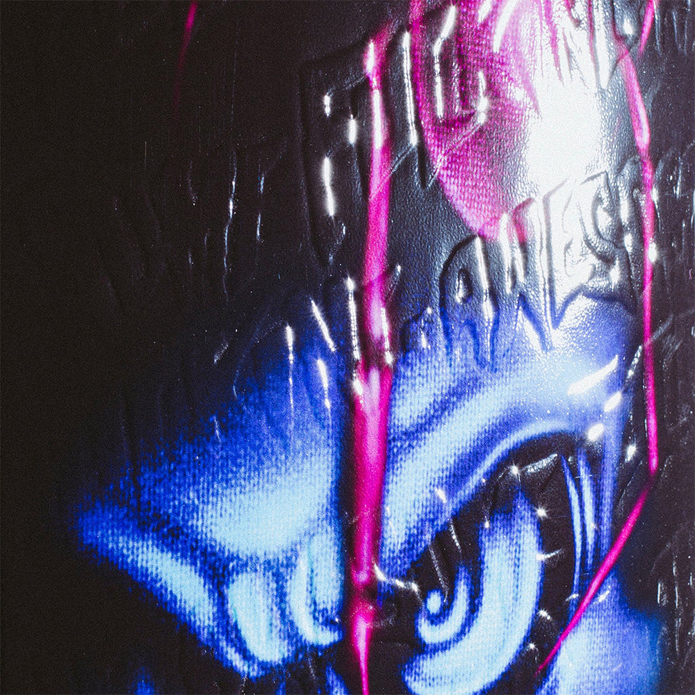 Close-up of a of the deck that shows the repeated embossed detail.